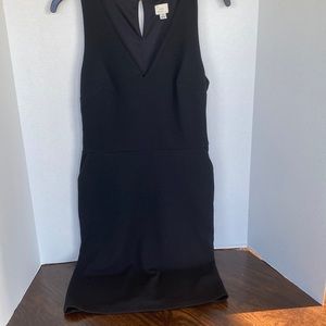 Black v neck dress with pockets